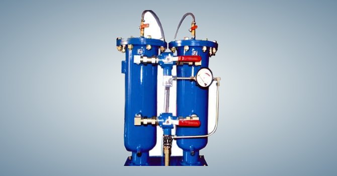 Duplex industrial bag filter vessels with valves and gauges by Unique Products India