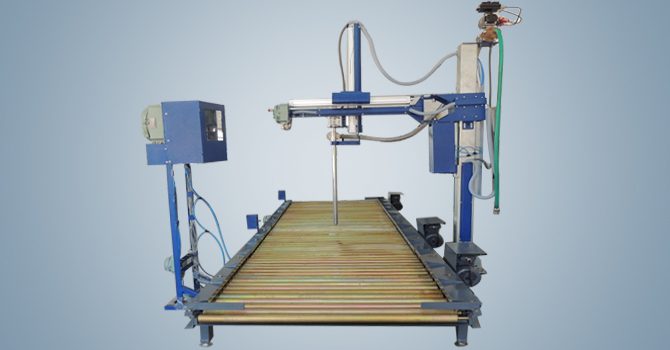 Powered roller conveyor with automatic drum filling gantry system by Unique Products India