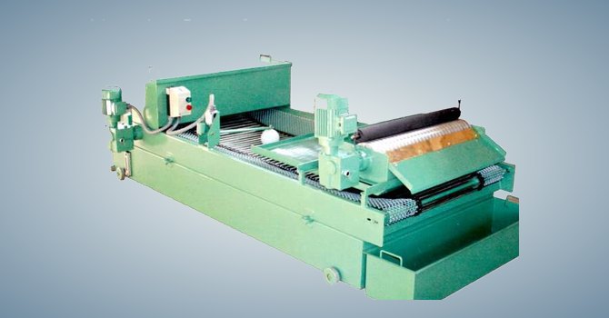 Paper band coolant filter with automatic roll indexing manufactured by Unique Products India