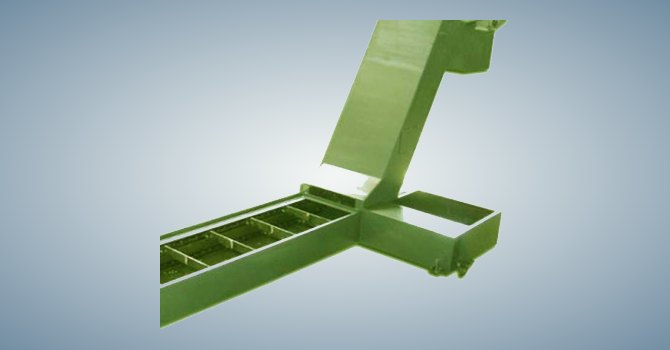 Green inclined scraper conveyor for fine chip handling by Unique Products India