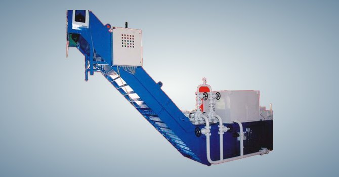 Industrial vacuum coolant filter with inclined conveyor and control panel by Unique Products India
